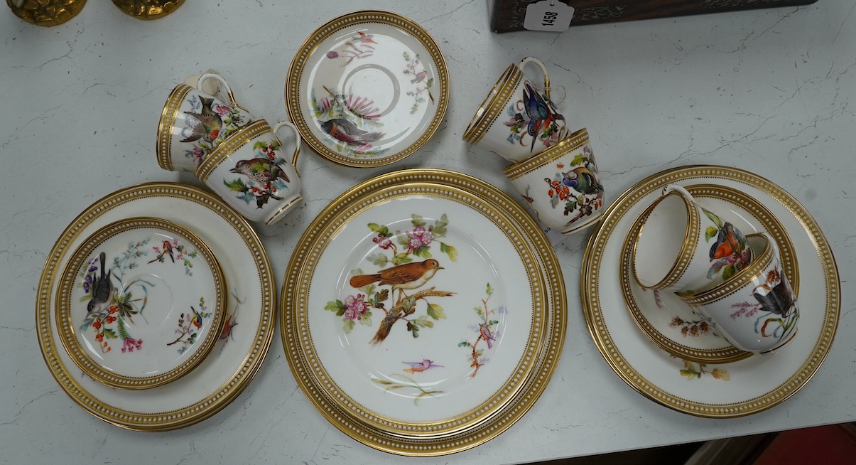 A 19th century Royal Worcester ornithologically decorated part tea set, with gilt and jewelled edges, six place setting. Condition - good